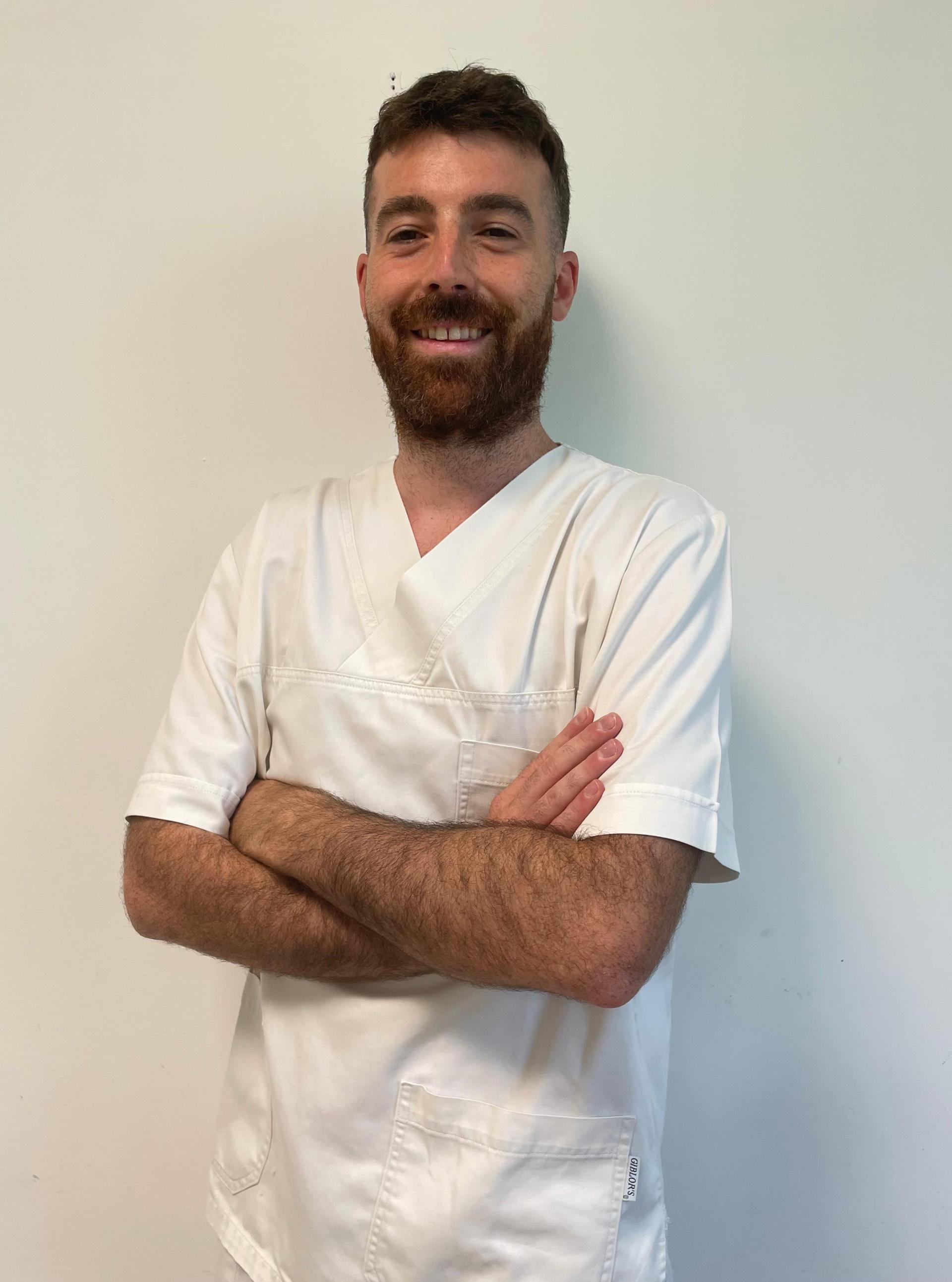Dr. Simone Santarini